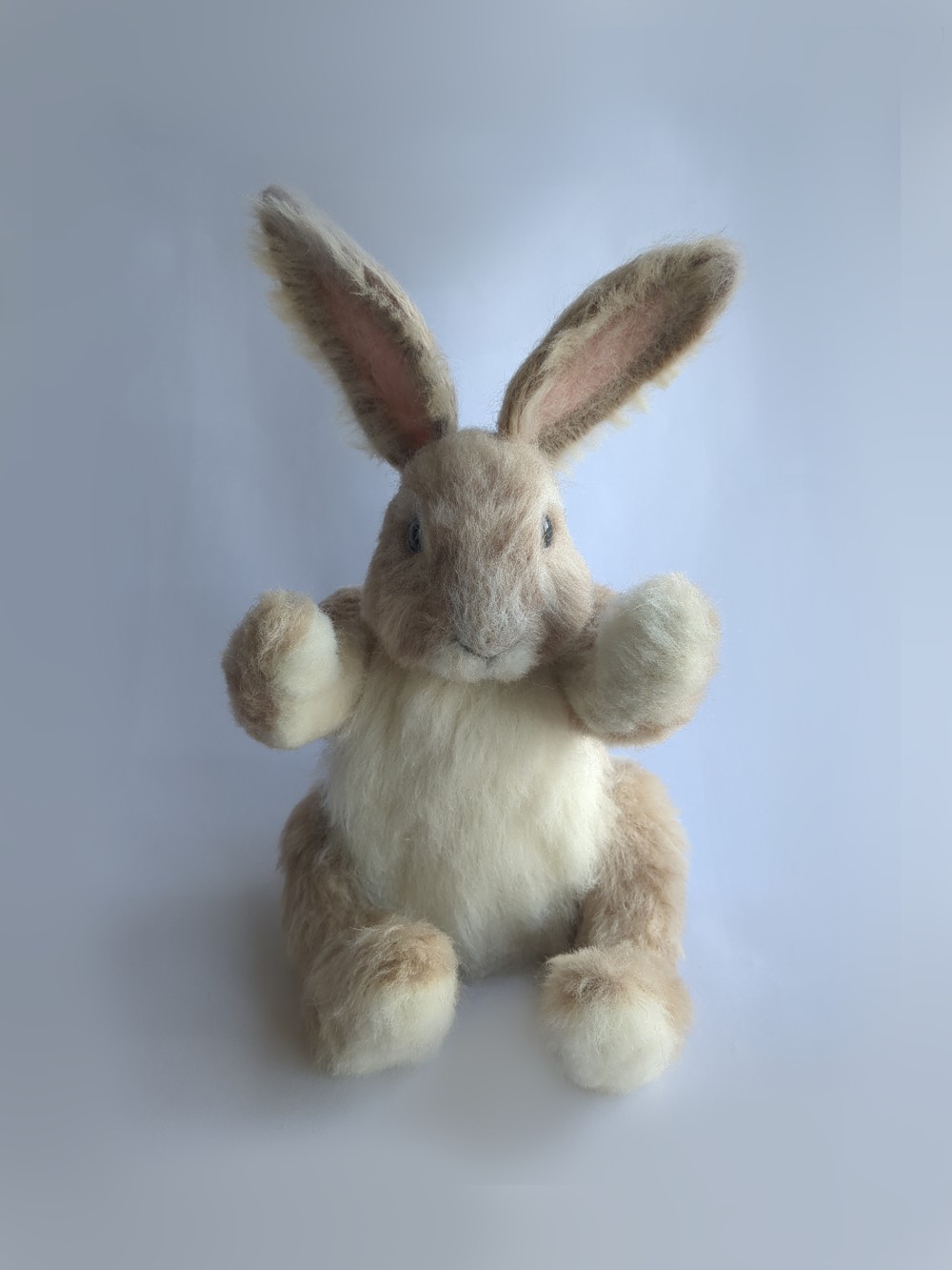 A handcrafted doll of Peetah the rabbit