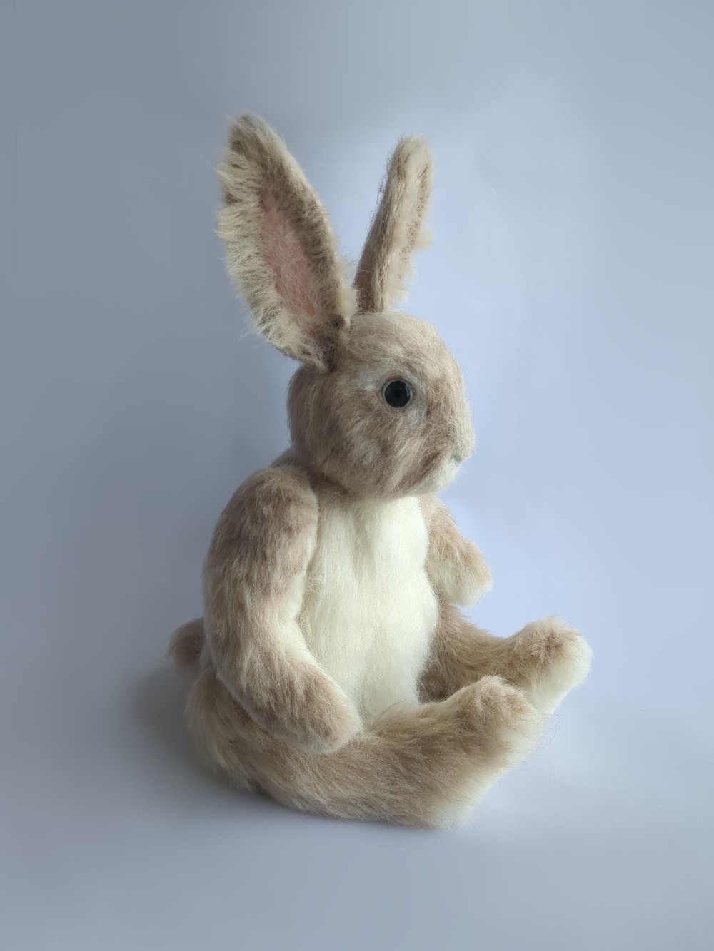 A handcrafted doll of Peetah the rabbit