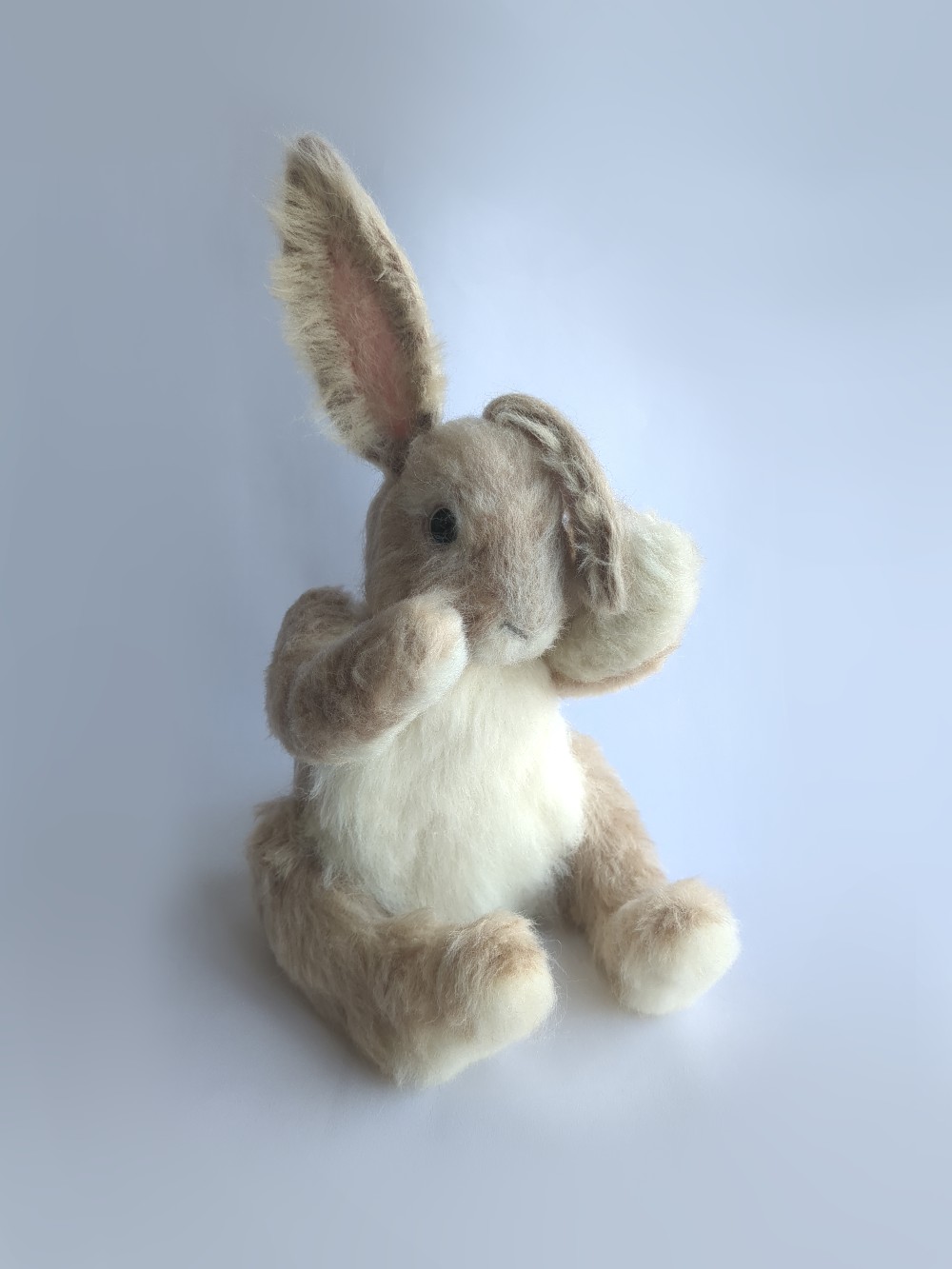 A handcrafted doll of Peetah the rabbit